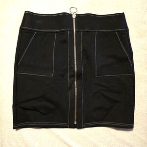 NEW INC zip front mini skirt.